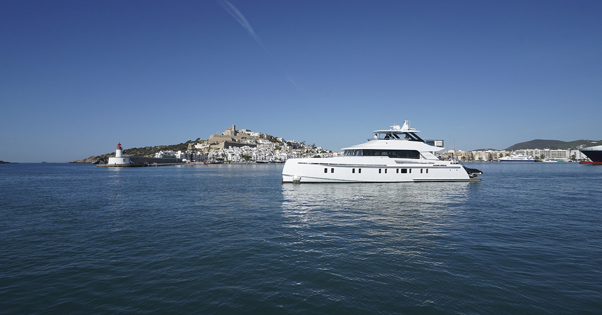boat with dalt vila in the background