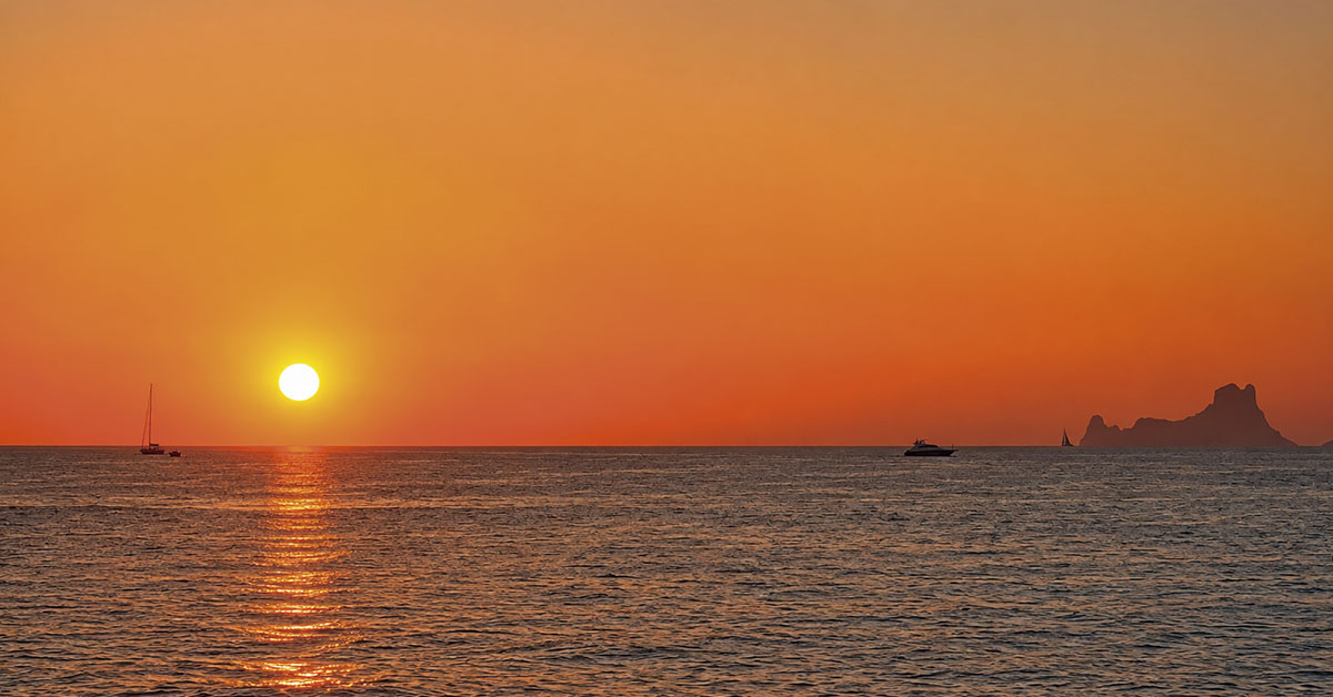Sunsets in Ibiza: the best places to watch the sun go down from the sea