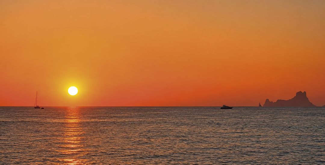 Sunsets in Ibiza: the best places to watch the sun go down from the sea